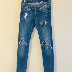 distressed denim jeans